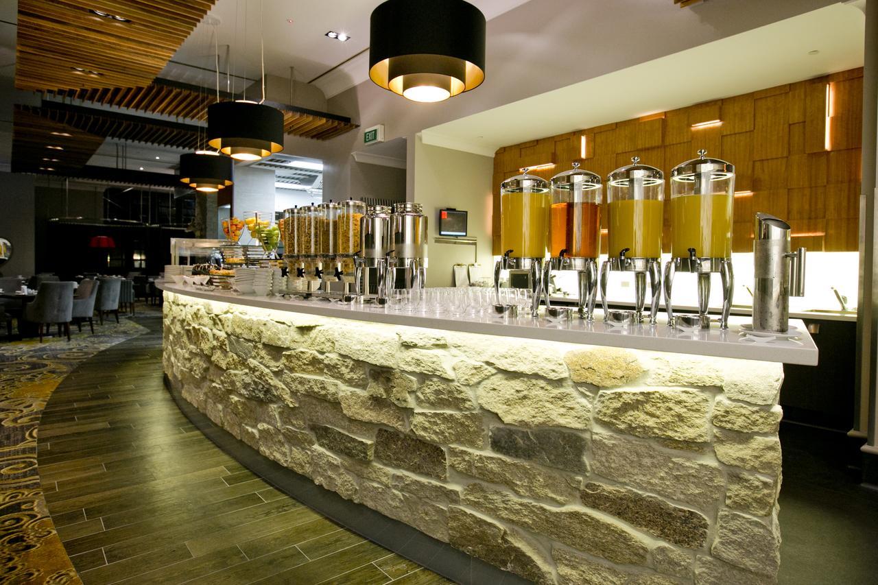 فندق دوكستون بيرث المظهر الخارجي الصورة The bar at the restaurant